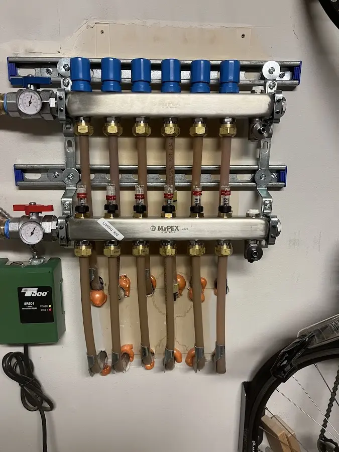 Plumber performing Water Heater Repair at a residential property in Clifton